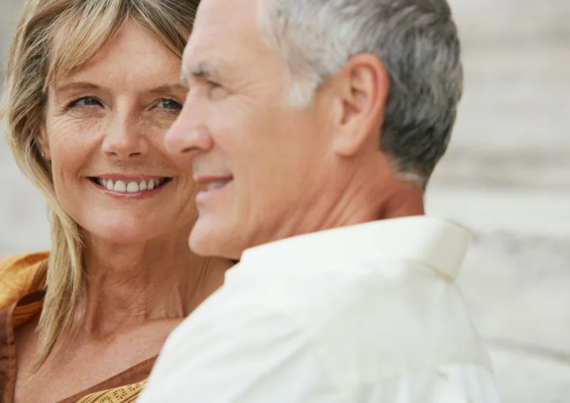 man and woman holding hands