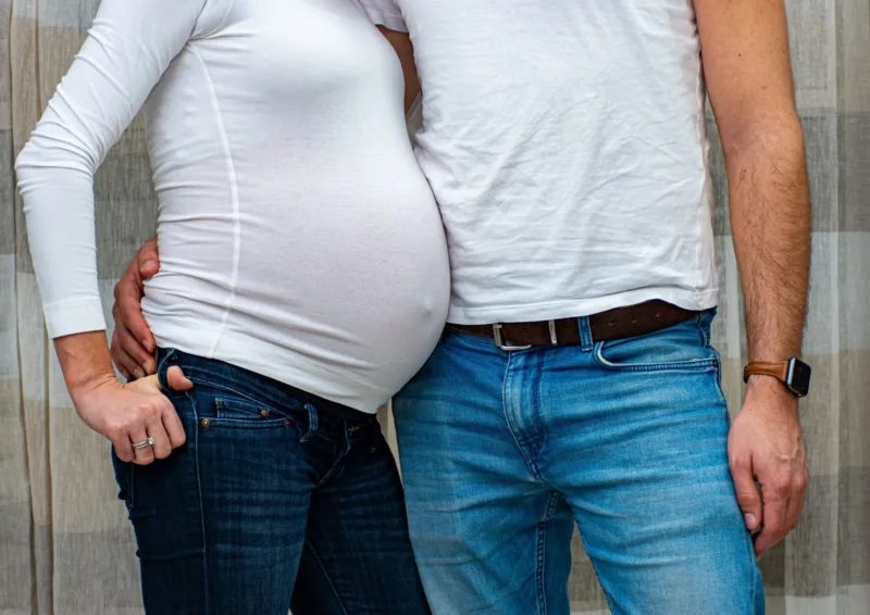 man and woman holding hands